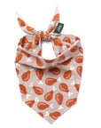 Dog bandana with drumstick pattern on beige background