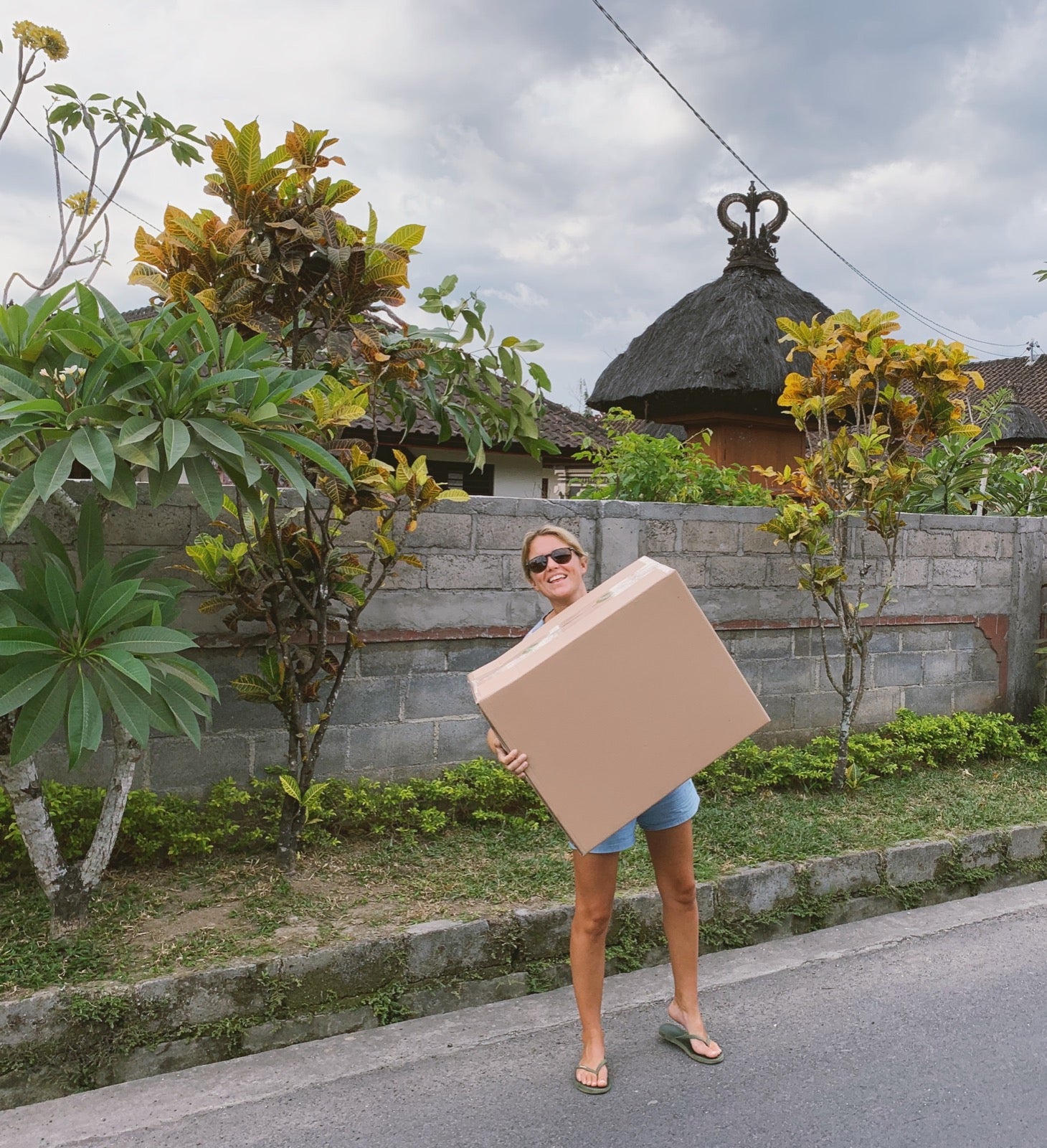 Libby outside The Paws Warehouse in Bali