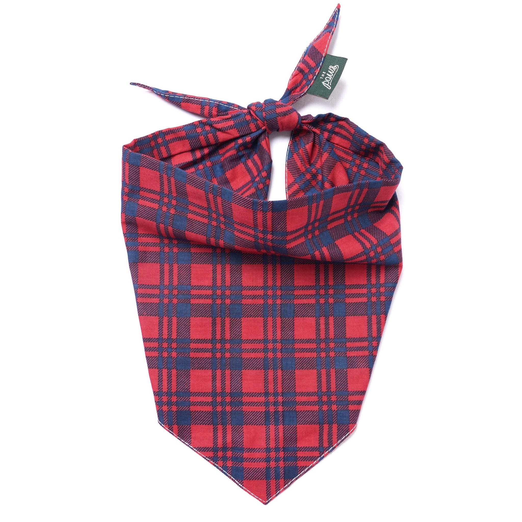 Red and blue plaid bandana with a brand tag on a white background