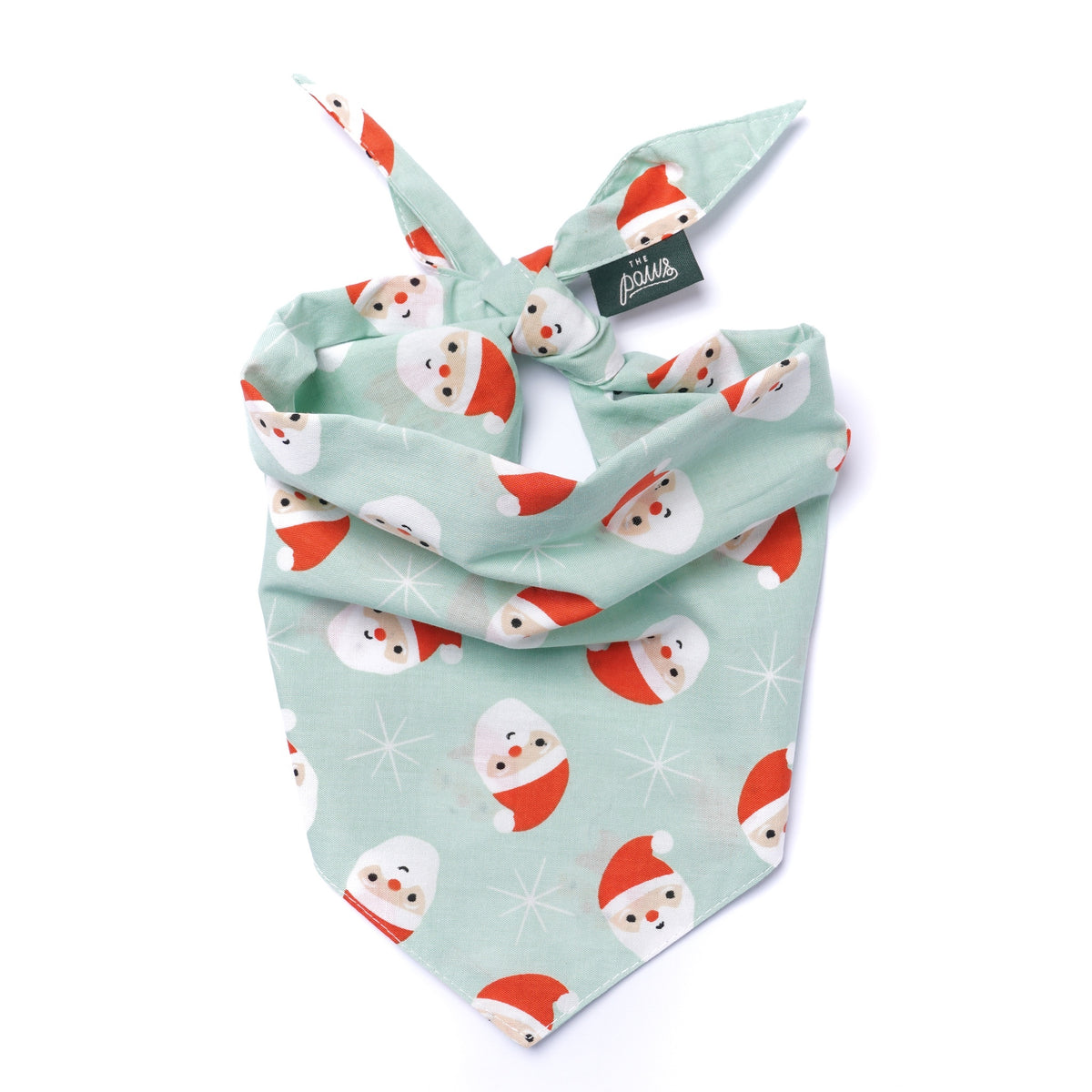 Dog bandana with snowman pattern on a light green background