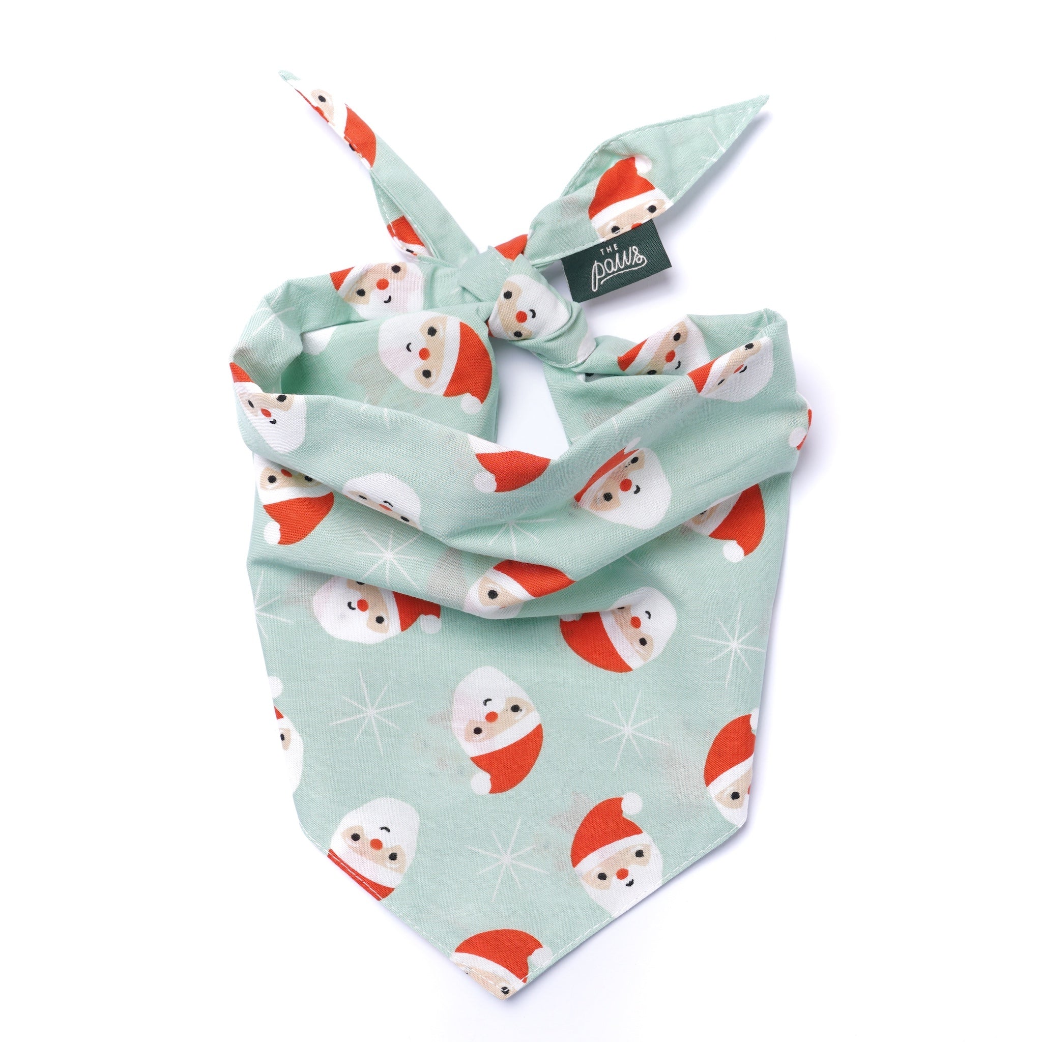 Dog bandana with snowman pattern on a light green background