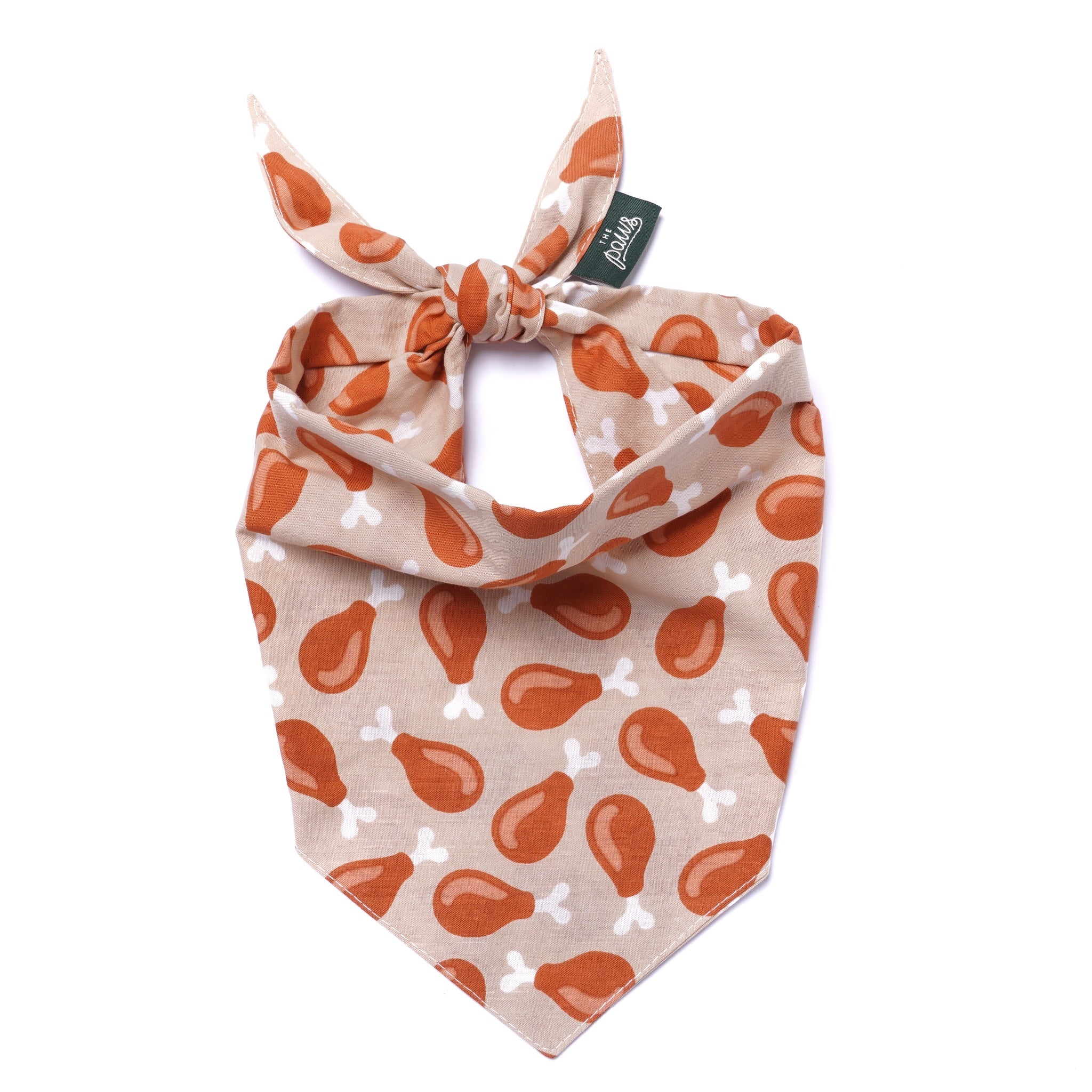 Dog bandana with drumstick pattern on beige background