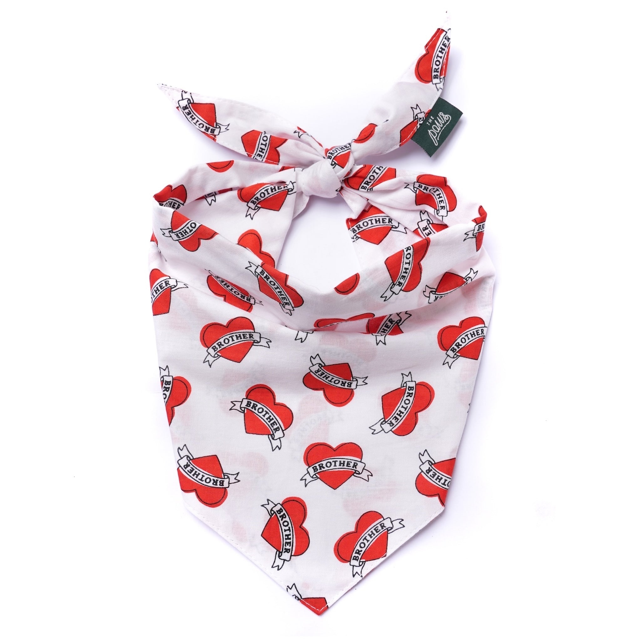 White bandana with red heart designs and text on a white background