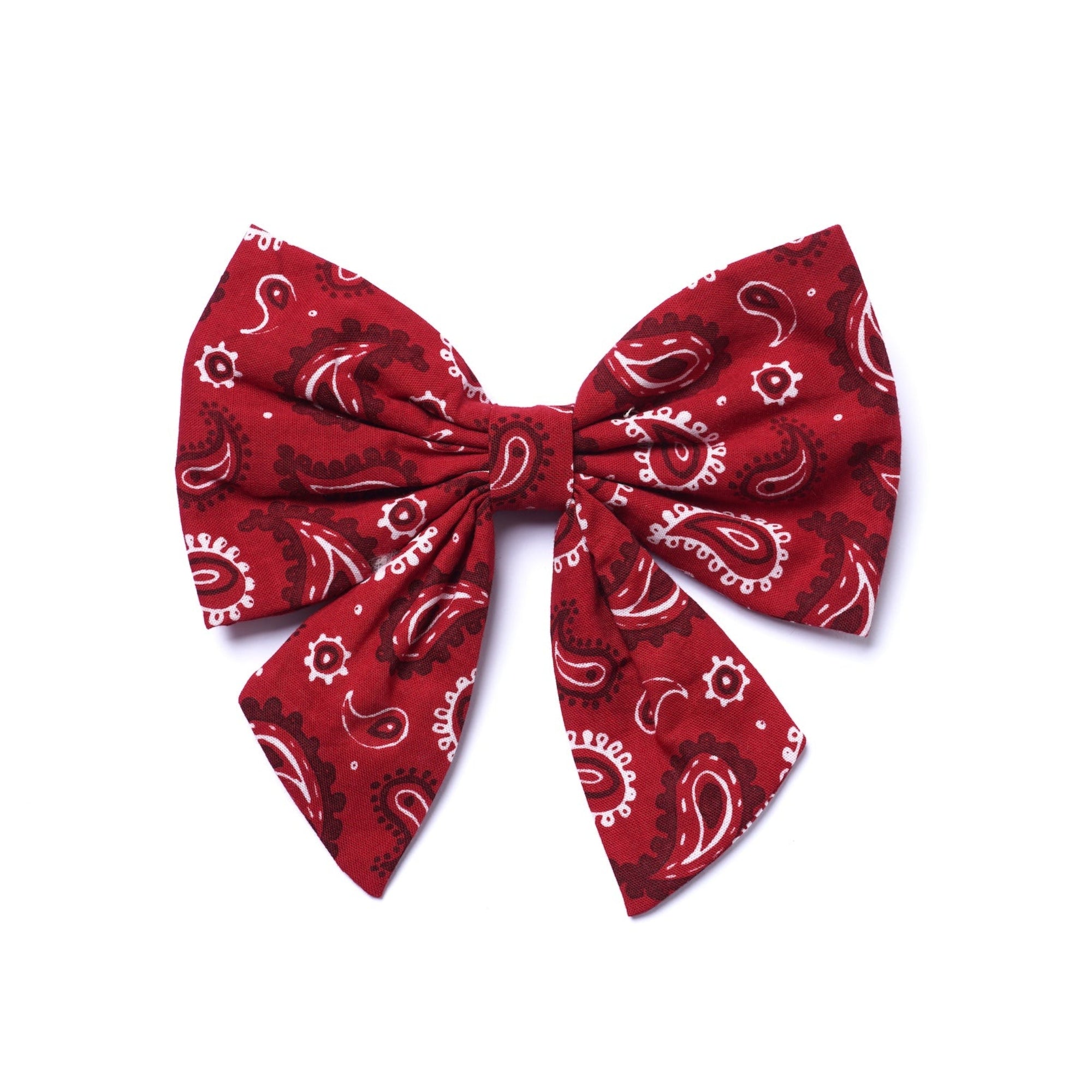 Red bandana bow with white patterns on a white background