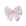 Large fabric bow with pink polka dots on a white background