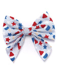 Colorful bow with star pattern on a white background